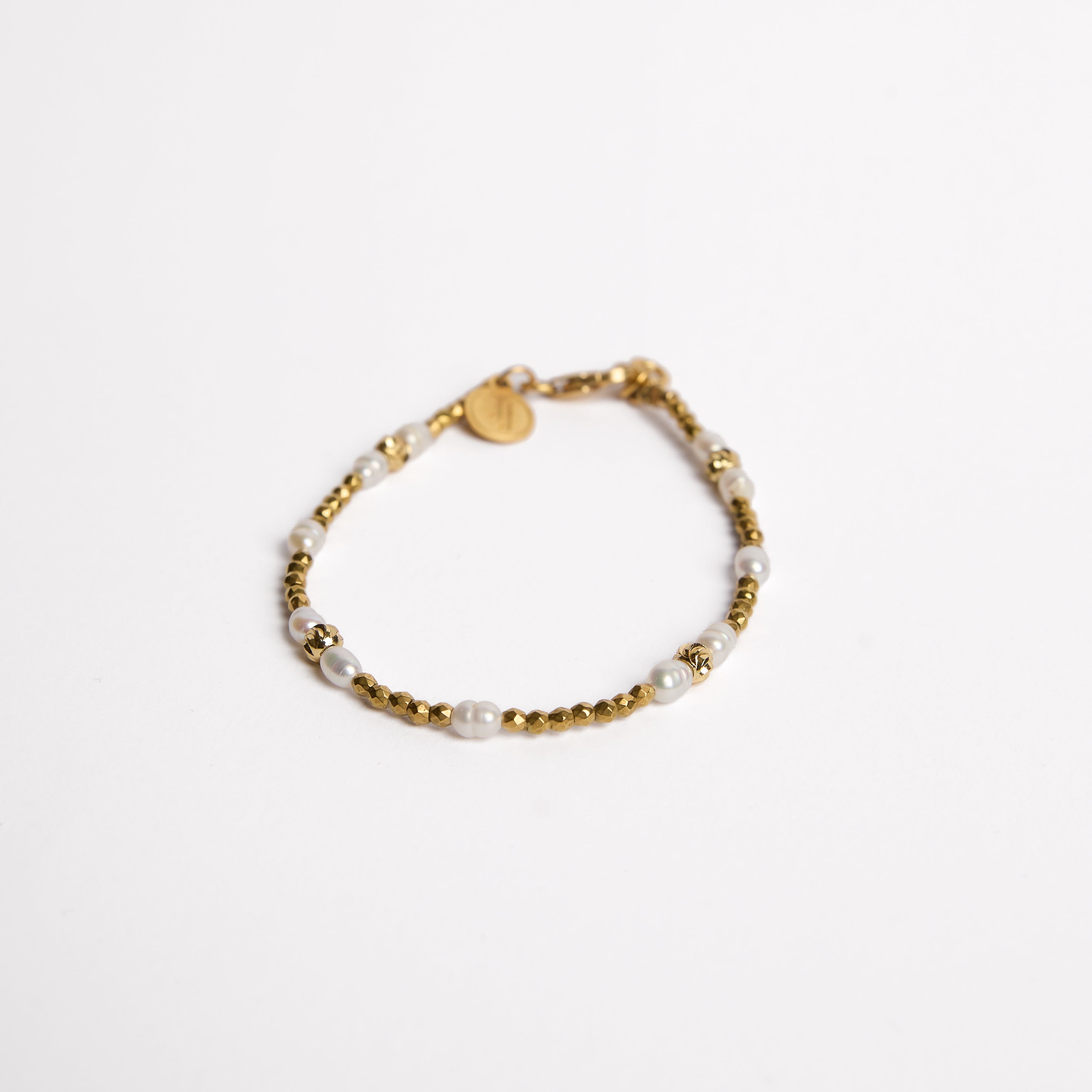 PULSERA DE HEMATITA - CON PERLAS