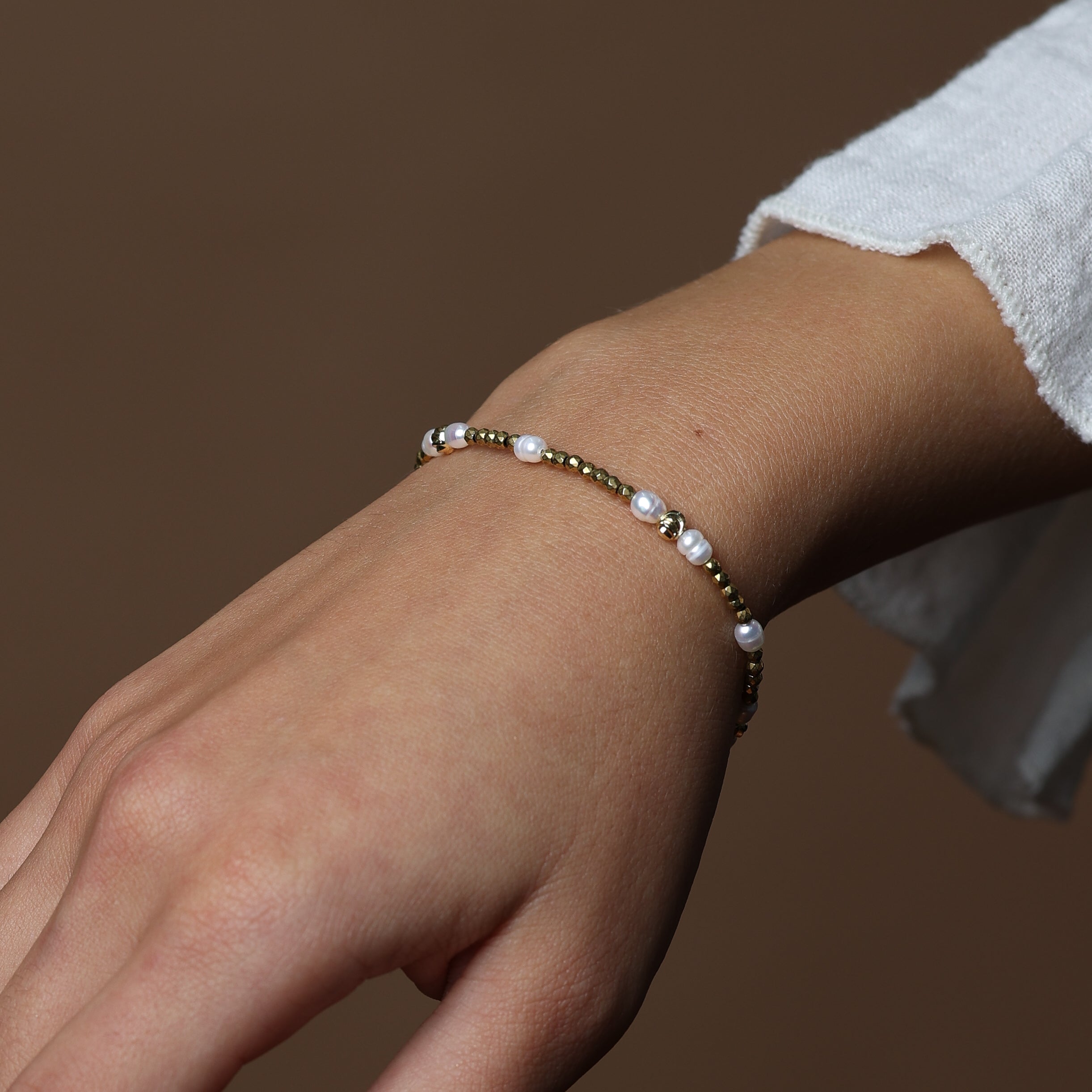PULSERA DE HEMATITA - CON PERLAS