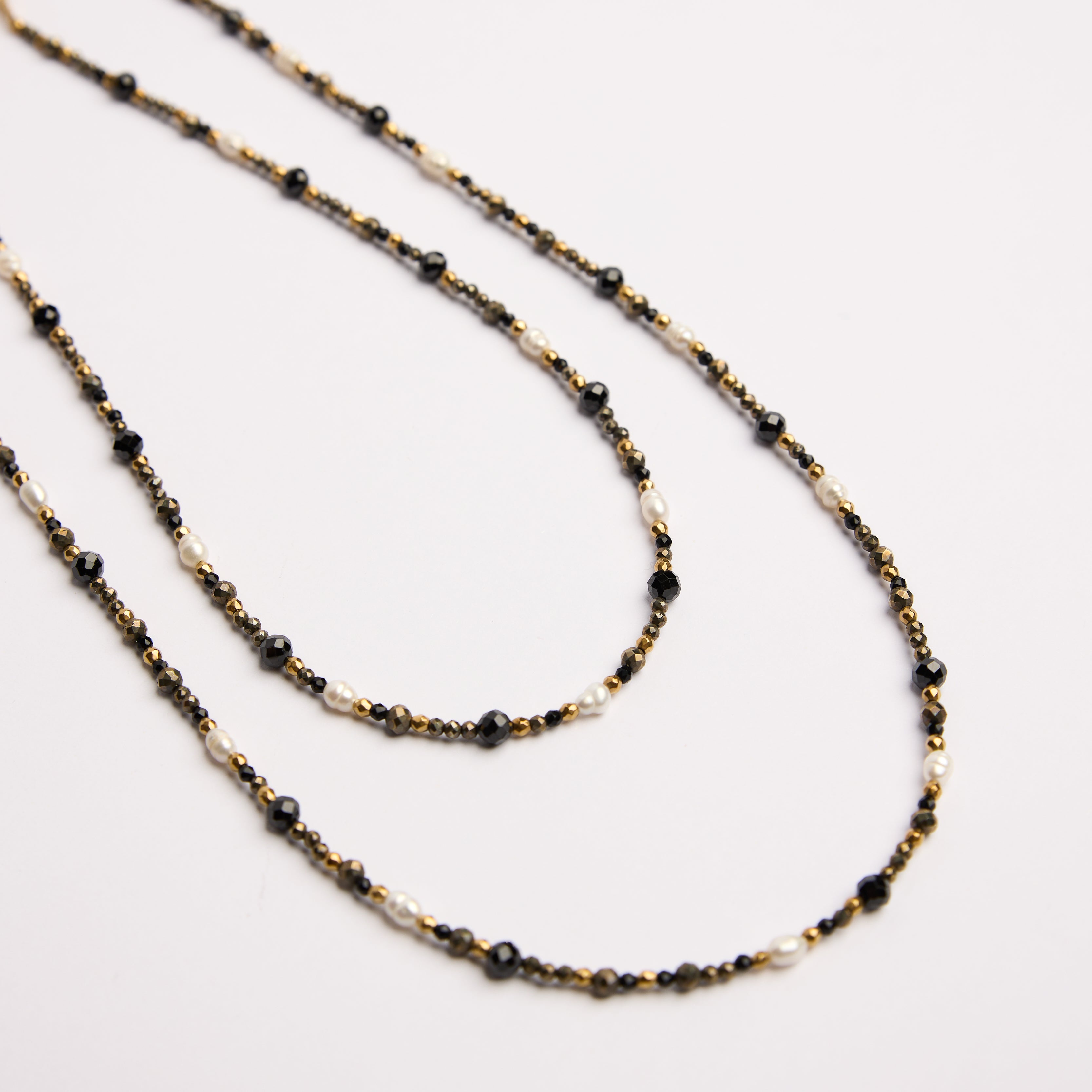 Collar de pirita con perlas de arroz y ónix